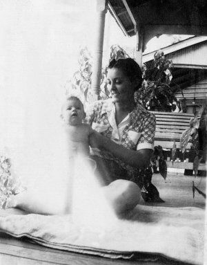 Francis Tripolino holding baby
