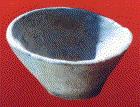 A small hand-made ceramic vessel