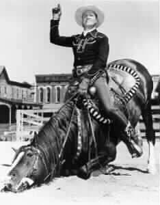 Champion  bows with rider Gene Autry