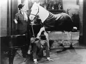 Laurel and Hardy with horse