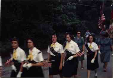 parading Girl Scouts