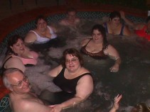 Image: people in hot tub at pool party