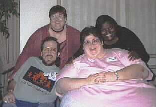 Image: Four people posing