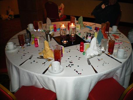 Image: table set for a party.