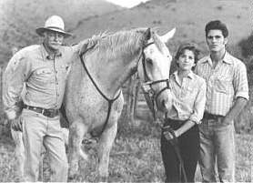 Farnsworth, Gilbert, Schoeffling with horse Sylvester